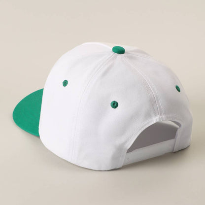 HE'S GOLFING Trucker Hat